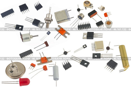 Радиодетали разного типа на белом фоне. Radio components on a white background. Стоковое фото, фотограф Татьяна Д / Фотобанк Лори