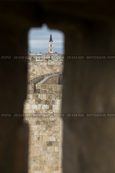 Ramparts walk with bell tower in background, Old city, Jerusalem, Israel (2017 год). Стоковое фото, фотограф Keith Levit / Ingram Publishing / Фотобанк Лори