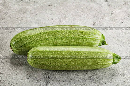 Raw green ripe zucchini vegetable. Стоковое фото, фотограф Андрей Старостин / Фотобанк Лори