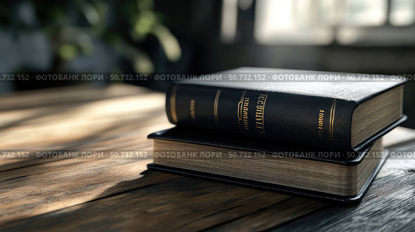 realistic bibles on table. Стоковое фото, фотограф Vectorwin / Фотобанк Лори