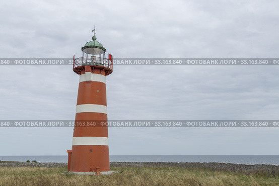Red and White Lighthouse. Стоковое фото, фотограф Niklas Emmoth / PantherMedia / Фотобанк Лори