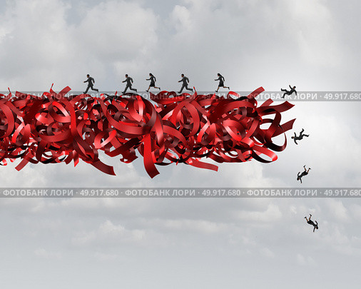 Red tape risk as a bureaucratic problem as employees running  and falling in bureaucracy and regulations as a business concept and symbol of government gridlock distress or corporate regulatory confusion. Стоковое фото, агентство Ingram Publishing / Фотобанк Лори