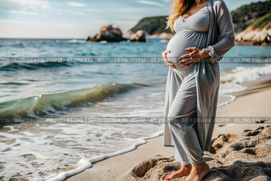Relaxation, peace of mind, sea air. Close-up of the tummy. A pregnant woman on the beach by the sea. The concept of pregnancy, childbirth and parental responsibilities. Стоковое AI-изображение, AI-художник Photojuli / Фотобанк Лори
