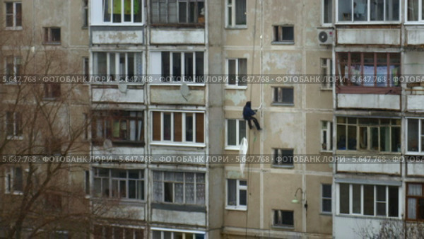 Ремонт швов на фасаде многоэтажного дома, таймлапс. Стоковое видео, видеограф Алексей Луковников / Фотобанк Лори