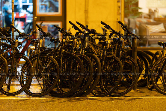 Rent Bicycles at nigth city - Ready for Adventure. Стоковое фото, фотограф Константин Шишкин / Фотобанк Лори