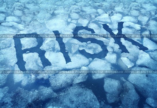 Risk and danger as a thin ice concept with the word imbedded in a cracked frozen lake warning any person to be very cautious as a business symbol of hazardous situation that is very dangerous. Стоковое фото, агентство Ingram Publishing / Фотобанк Лори