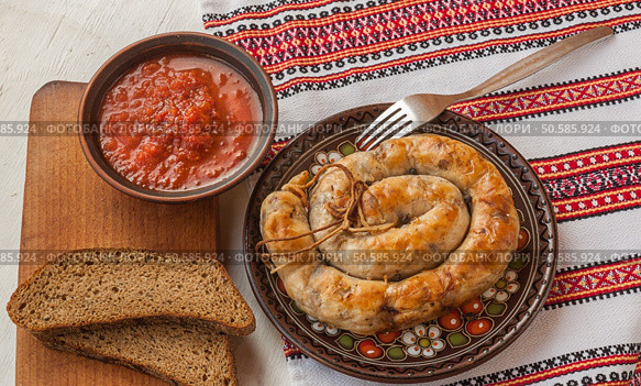 Roasted homemade sausages and rye bread. Стоковое фото, агентство Ingram Publishing / Фотобанк Лори