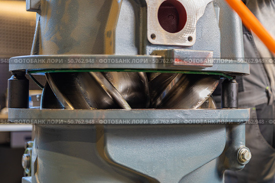 Roots type blower showing the rotating blades inside the casing. Стоковое фото, фотограф Юрий Поздников / Фотобанк Лори