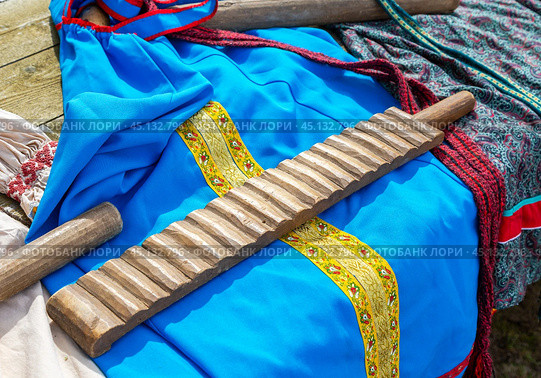 Rubel is a wooden board which at home ironed home linen in ancient times. Стоковое фото, фотограф FotograFF / Фотобанк Лори