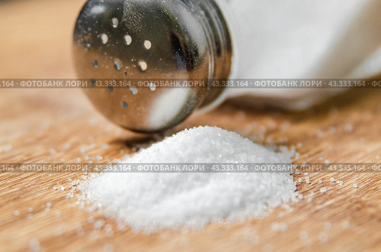 Salt background . On wooden table. Стоковое фото, фотограф Артем Шадрин / Фотобанк Лори