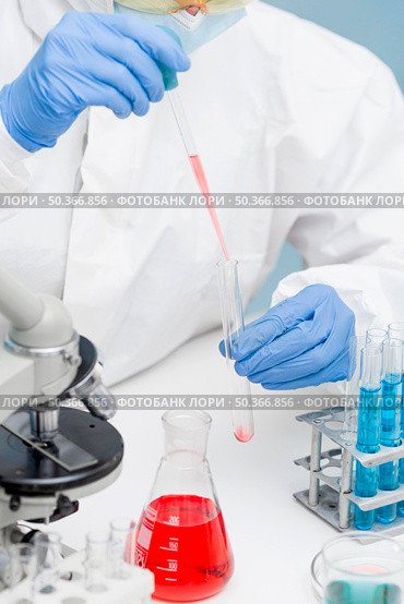 scientist working with chemical substances lab. Стоковое фото, агентство Ingram Publishing / Фотобанк Лори