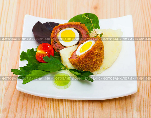 Scotch egg with quail eggs. Стоковое фото, фотограф Яков Филимонов / Фотобанк Лори