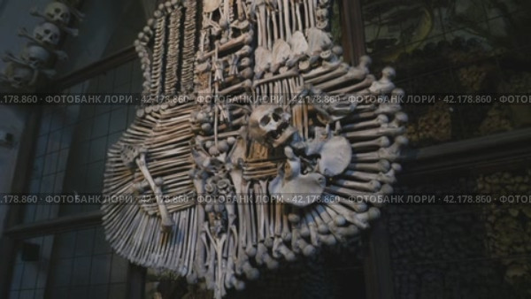 Sedlec, Kutna Hora, Czech Republic - October 17, 2018. Macabre Architectural Detail: Human Skulls in Decor. Стоковое видео, видеограф Даниил Хабаров / Фотобанк Лори