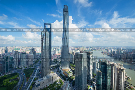 SHANGHAI - AUG 13, 2015: Jin Mao Tower, Shanghai tower, Shanghai World Financial Center and river quay, view from IFC hotel, 990 skyscrapers are in Shanghai. Редакционное фото, фотограф Losevsky Pavel / Фотобанк Лори