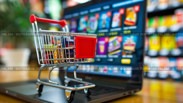 Shopping Cart on Top of Laptop Computer. Стоковое AI-изображение, AI-художник Юлия Гапеенко / Фотобанк Лори