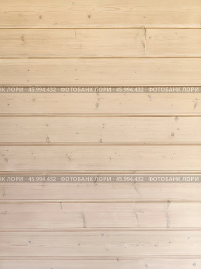 Simple wooden wall vertical background with horizontal planks showcasing natural texture in a bright interior setting. Стоковое фото, фотограф Александра Селина / Фотобанк Лори
