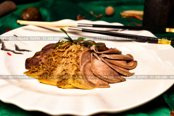 Sliced Delicacy a Study in Traditional Chinese Cuisine and Presentation. Стоковое фото, фотограф Aleksandr Golubev / Фотобанк Лори