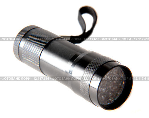 small electric flashlight on a white background. Стоковое фото, фотограф Andrey Lipinskiy / PantherMedia / Фотобанк Лори