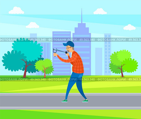 Smiling elderly male targeting with slingshot, side and full length view of aged man wearing casual clothes, cap and glasses holding catapult vector. Aged Male Targeting with Catapult in Park Vector. Стоковая иллюстрация, агентство Ingram Publishing / Фотобанк Лори