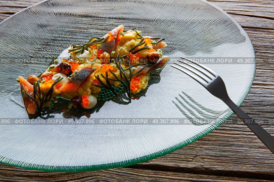 Smoked sardines salad with creamy cheese corn codium and hazelnuts. Стоковое фото, агентство Ingram Publishing / Фотобанк Лори