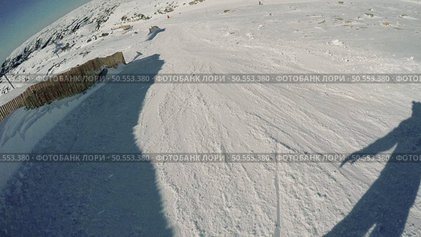 Snowboard freerider in the mountains. Стоковое фото, агентство Ingram Publishing / Фотобанк Лори