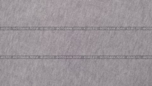 Soft Knitted Woolen Detailed Texture. Natural Fabric Closeup Knit Pattern. Gray Knitwear, Warm Cashmere Surface. Rotation, Macro. Cozy Textile Background. Clothes Production. Melange Yarn. 4K Shot. Стоковое видео, видеограф Марина Демидюк / Фотобанк Лори