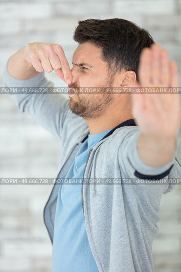 someone farted and it smells very bad. Стоковое фото, агентство Ingram Publishing / Фотобанк Лори