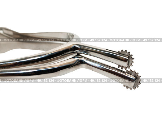 spurs  with star roll at white background. Стоковое фото, агентство Ingram Publishing / Фотобанк Лори
