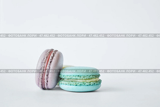Stack of two colorful French Macarons, macaroons cakes with different flavors. Стоковое фото, фотограф Екатерина Якименко / Фотобанк Лори