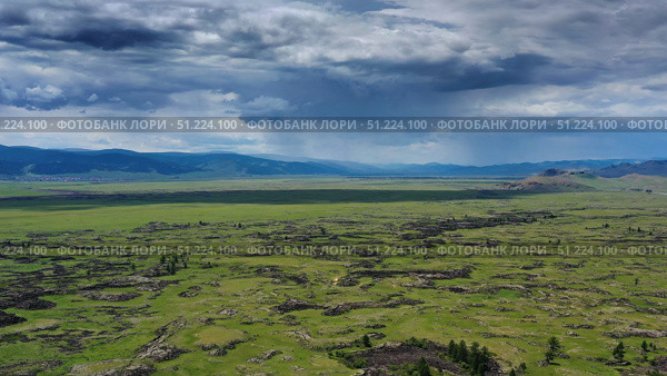 Steppe and mountains with rain landscape. Стоковое фото, фотограф Михаил Коханчиков / Фотобанк Лори