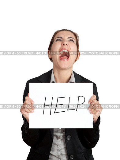 Stressed business woman imploring for help, holding a cardboard with the message "Help" Стоковое фото, агентство Ingram Publishing / Фотобанк Лори