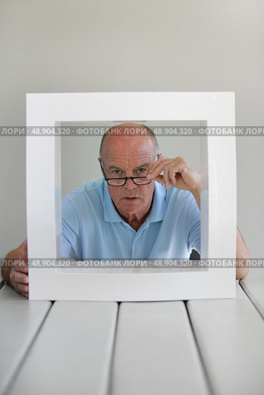Stubborn bald man. Стоковое фото, агентство Ingram Publishing / Фотобанк Лори