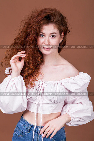 Studio portrait of a red-haired girl. Стоковое фото, фотограф Андрей Аркуша / Фотобанк Лори