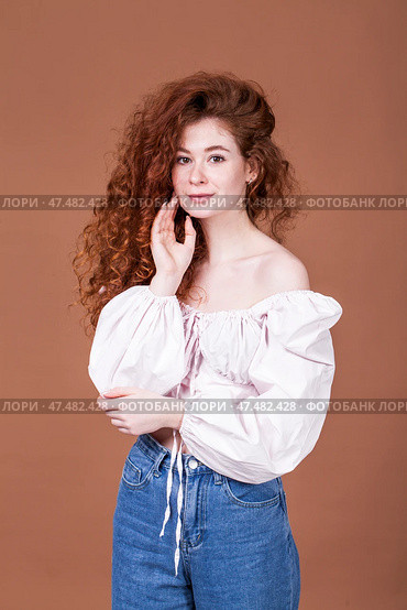 Studio portrait of a red-haired girl. Стоковое фото, фотограф Андрей Аркуша / Фотобанк Лори