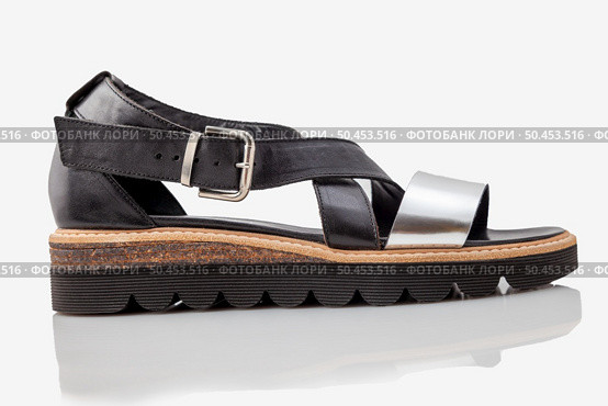 stylish, comfortable, women sandal on a white background. Стоковое фото, агентство Ingram Publishing / Фотобанк Лори