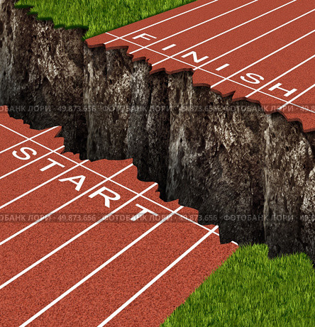 Success Risk and conquering adversity in reaching your goals as a business concept represented by a track and field race track with start and finish lines seperated by a deep and dangerous rock cliff. Стоковое фото, агентство Ingram Publishing / Фотобанк Лори
