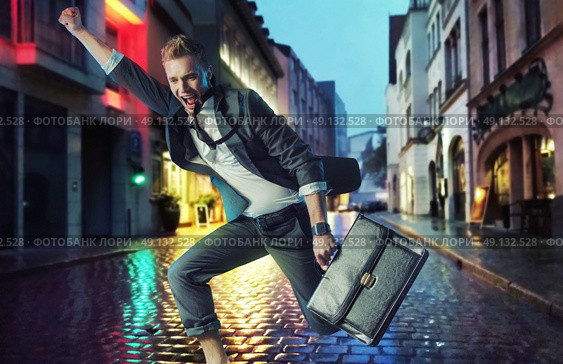 Successful businessman making a victorious gesture. Стоковое фото, агентство Ingram Publishing / Фотобанк Лори