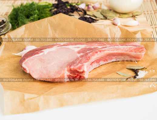Свиное мясо. Стейк рибай. Свежая сырая свинина со специями. Meat. Fresh raw pork and spices. Ribeye Steak. Стоковое фото, фотограф AllNikArt / Фотобанк Лори