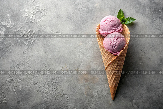 Sweet dessert. Ice cream cones with different flavors on a concrete gray background. World Ice Cream Day. Стоковое AI-изображение, AI-художник Photojuli / Фотобанк Лори