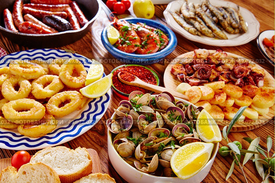 Tapas from spain varied mix of most popular tapa mediterranean food. Стоковое фото, агентство Ingram Publishing / Фотобанк Лори