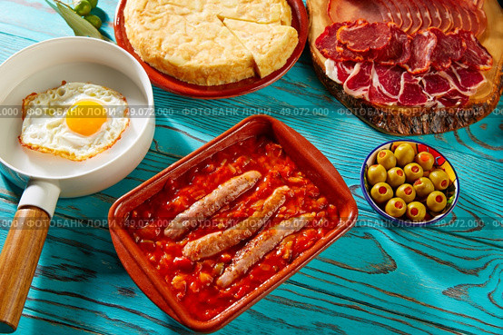 Tapas pisto con tomate ratatouille egg and sausage from Spain. Стоковое фото, агентство Ingram Publishing / Фотобанк Лори