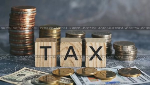 Tax season. Taxation. Word Tax on wooden blocks, calculator, coins stack. Paperwork, financial research, report. Calculation tax return. Personal banking. Finance. Planning budget. Calculating expense. Стоковое AI-видео, аниматор Марина Демидюк / Фотобанк Лори
