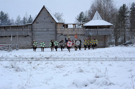 The festival is a historical reconstruction of the Viking Age in winter. Vikings attack with shields and helmets (2014 год). Редакционное фото, фотограф Анна Кривицкая / Фотобанк Лори