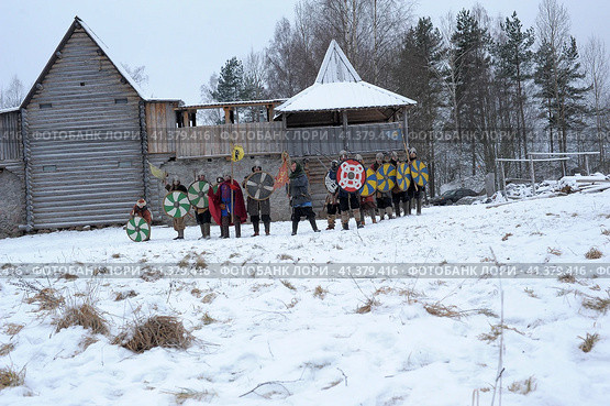 The festival is a historical reconstruction of the Viking Age in winter. Vikings attack with shields and helmets (2014 год). Редакционное фото, фотограф Анна Кривицкая / Фотобанк Лори