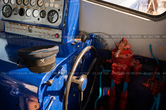 The old train control panel. Train driver. Control devices in the driver's cabin on railway transport. Стоковое фото, фотограф Photojuli / Фотобанк Лори