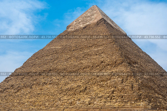 The pyramid of Khafre more precisely Khafra is the second largest ancient Egyptian pyramid. Located next to the Great Sphinx, as well as the pyramids of Cheops Khufu view from the base (2021 год). Стоковое фото, фотограф Павел Муравьев / Фотобанк Лори