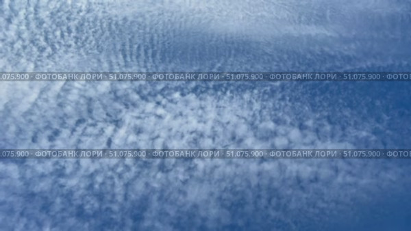 The sky is blue with white clouds. Стоковое видео, видеограф Ярославский Максим / Фотобанк Лори