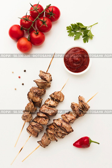 top view delicious kebab with tomatoes ketchup. High resolution photo. top view delicious kebab with tomatoes ketchup. High quality photo. Стоковое фото, агентство Ingram Publishing / Фотобанк Лори
