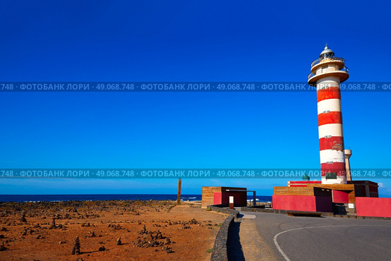 Toston lighthouse in El Cotillo at Fuerteventura Canary Islands. Стоковое фото, агентство Ingram Publishing / Фотобанк Лори
