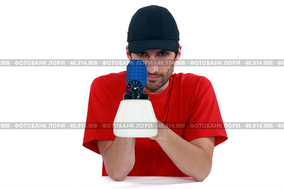 Tradesman holding a spray gun. Стоковое фото, агентство Ingram Publishing / Фотобанк Лори